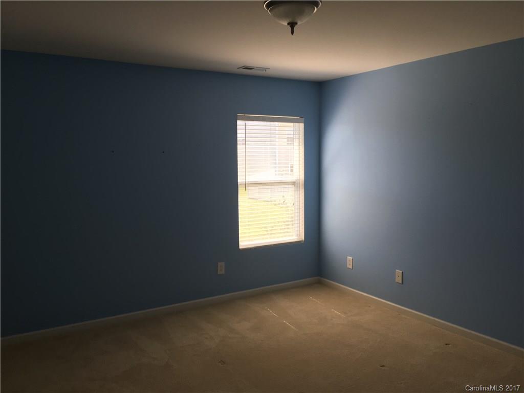 1011 Rural Farm Road Indian Trail, NC 28079 - Photo 17 of 24 an empty room with a window