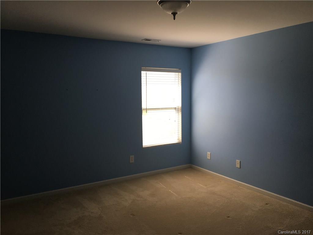 1011 Rural Farm Road Indian Trail, NC 28079 - Photo 22 of 24 an empty room with a window