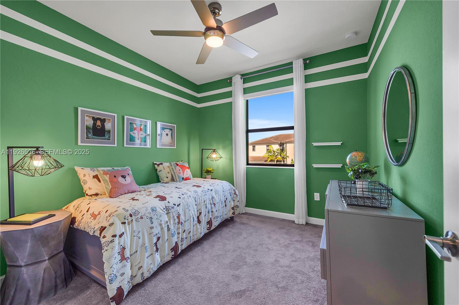 12980 Southwest 233rd Terrace Homestead, FL 33032 - Photo 25 of 28 a bedroom with a bed windows and a chandelier