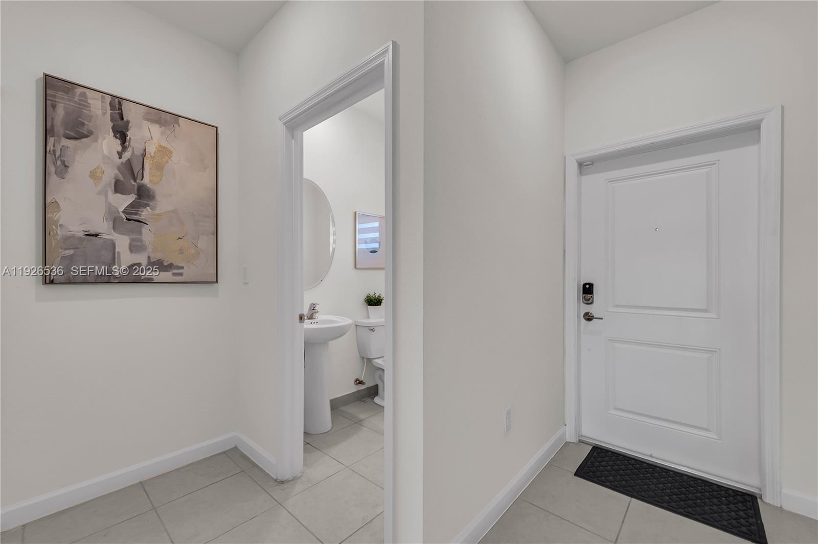 12980 Southwest 233rd Terrace Homestead, FL 33032 - Photo 5 of 28 a bathroom with a toilet and a shower