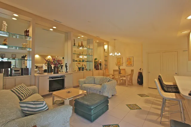 a living room with furniture and a table