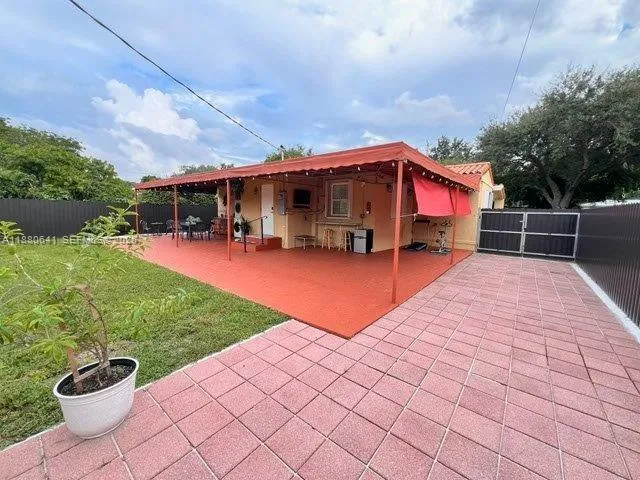 a view of a chairs and tables in the patio
