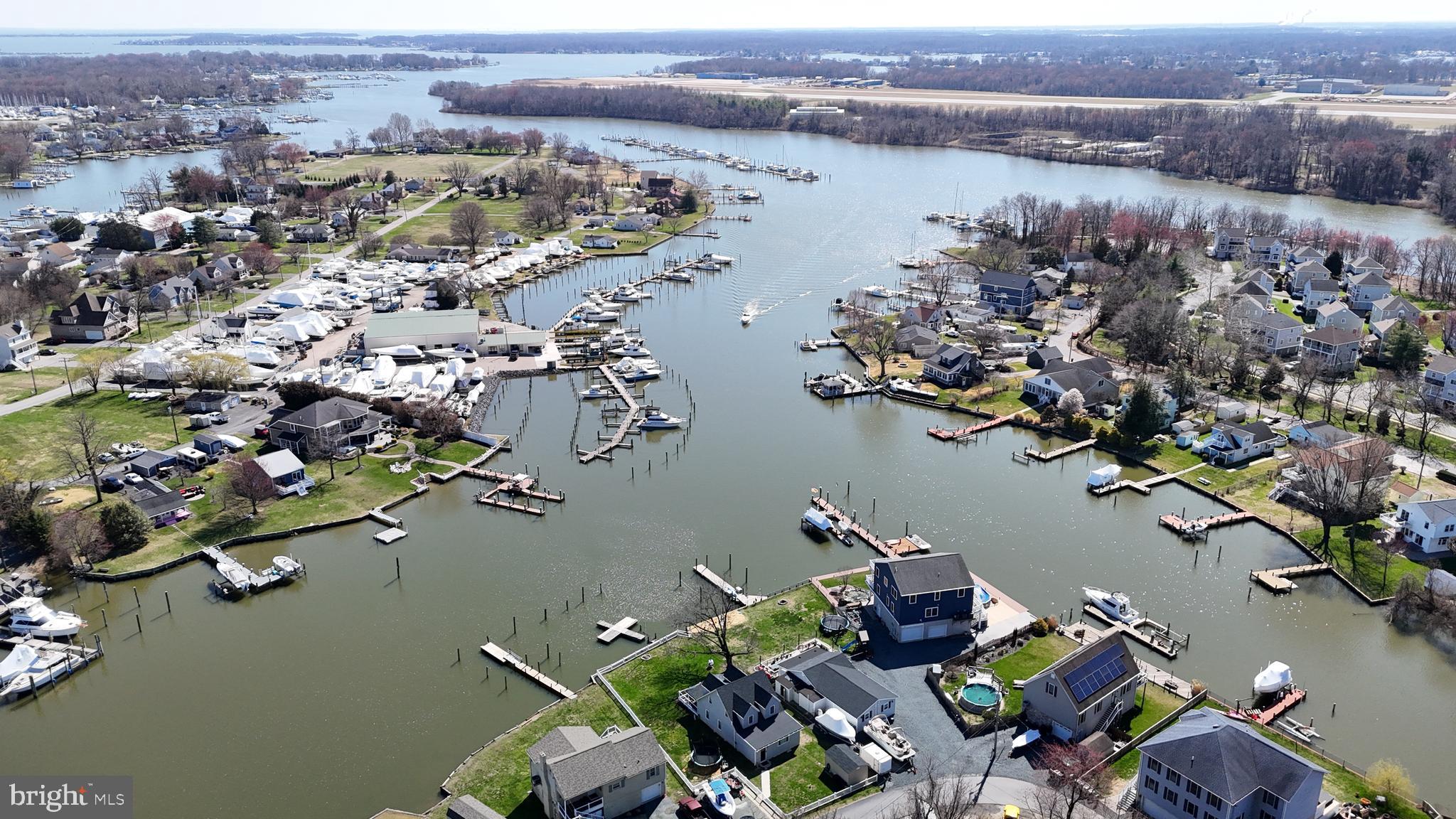 109 Hughes Shore Road Baltimore, MD 21220 - Photo 11 of 43 an aerial view of house with yard swimming pool and ocean view
