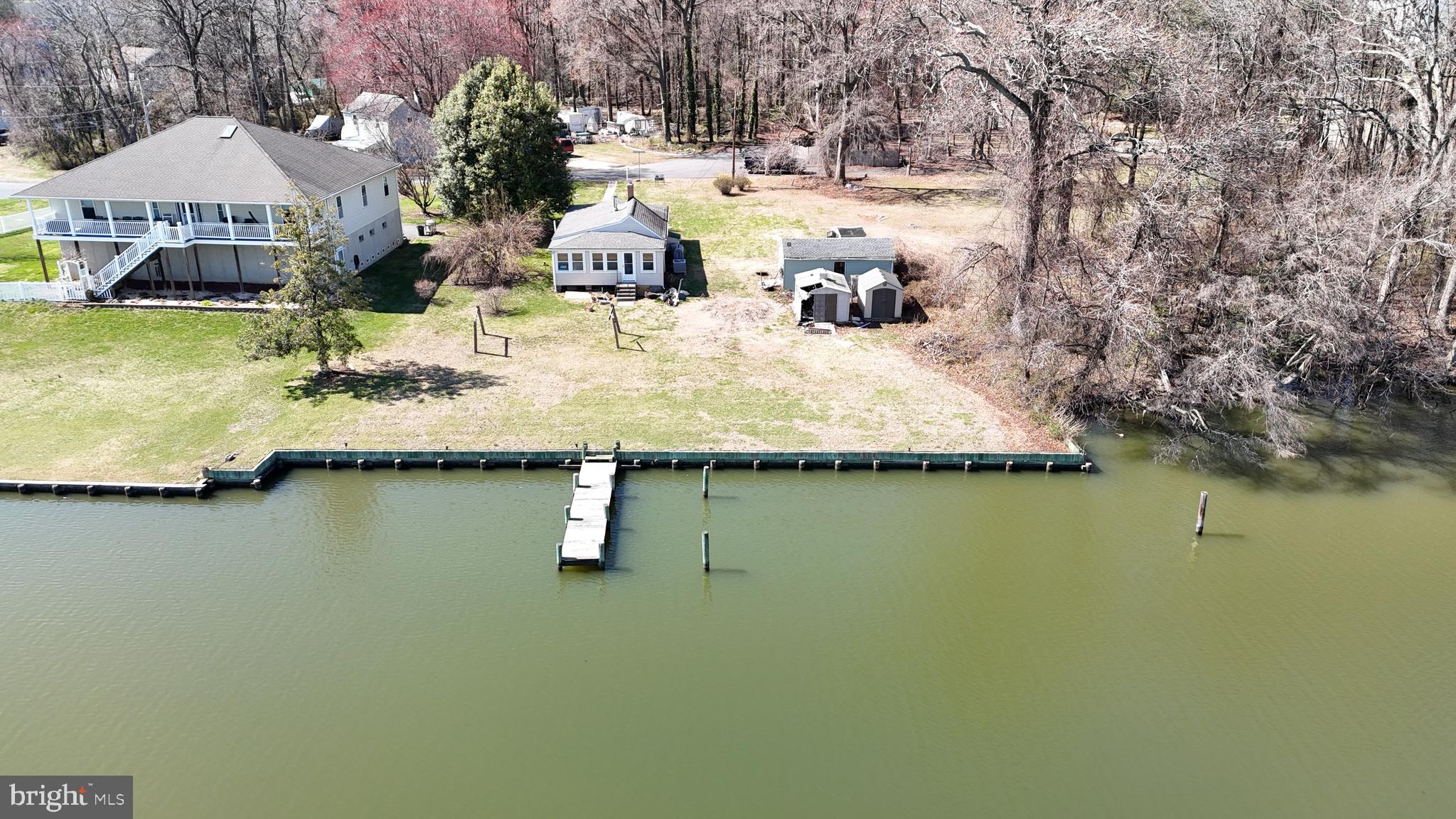 109 Hughes Shore Road Baltimore, MD 21220 - Photo 14 of 43 a view of a lake with house