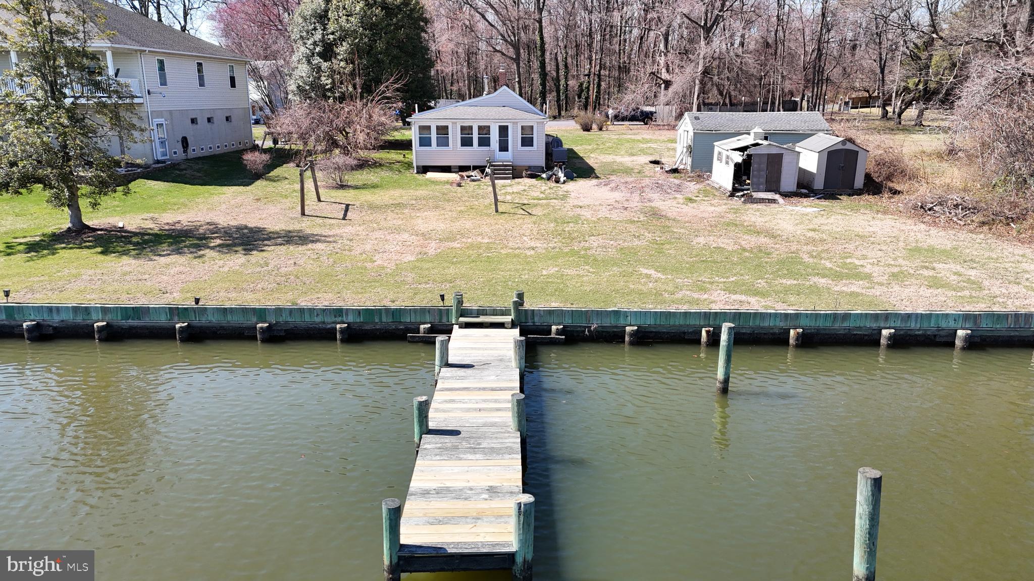 109 Hughes Shore Road Baltimore, MD 21220 - Photo 15 of 43 a view of a lake with houses