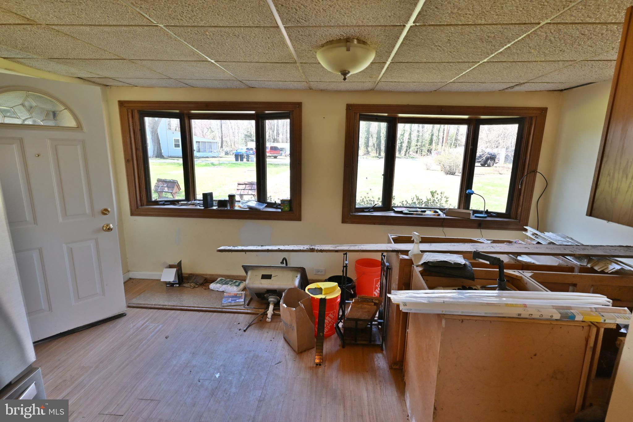 109 Hughes Shore Road Baltimore, MD 21220 - Photo 20 of 43 a view of an entryway with wooden floor