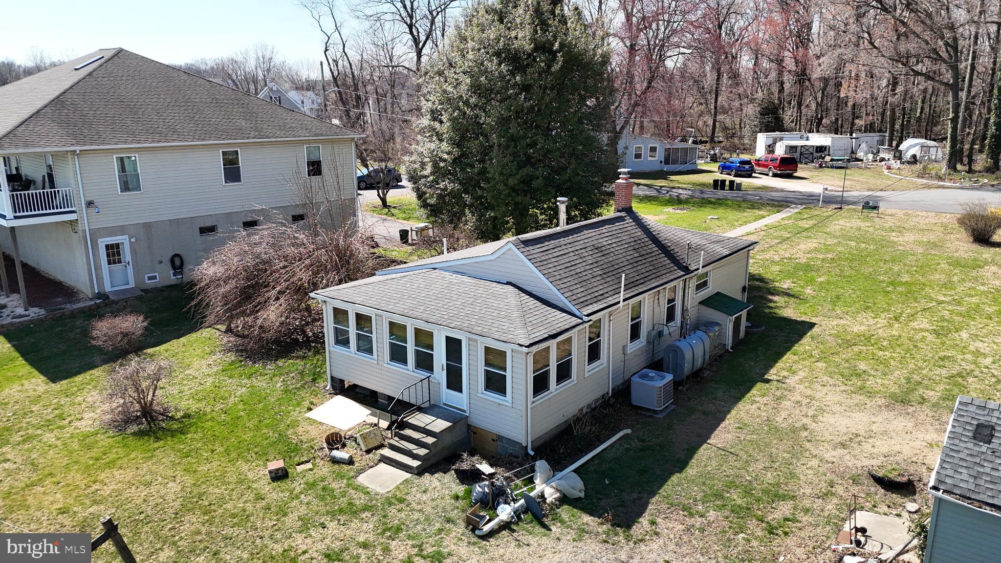 109 Hughes Shore Road Baltimore, MD 21220 - Photo 38 of 43 a view of a house with pool and chairs