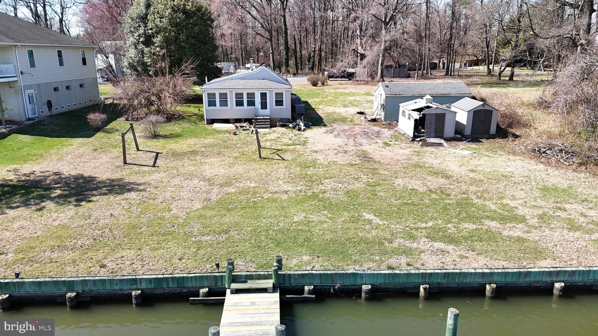 109 Hughes Shore Road Baltimore, MD 21220 - Photo 39 of 43 a view of a lake with houses
