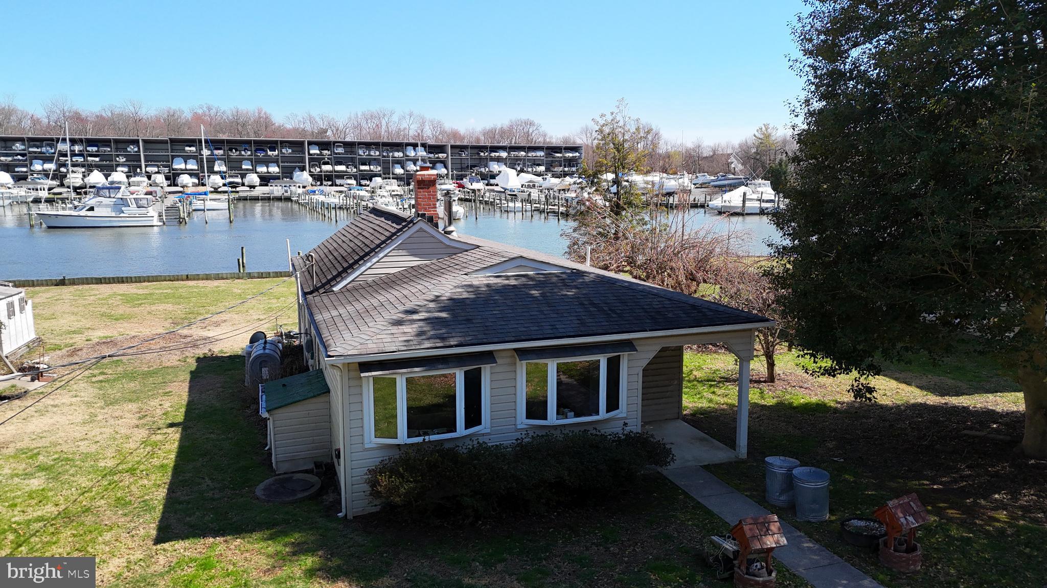 109 Hughes Shore Road Baltimore, MD 21220 - Photo 4 of 43 a aerial view of a house