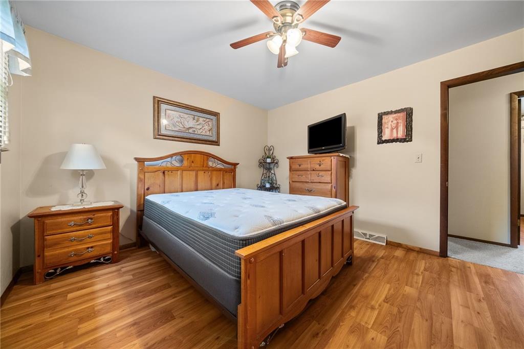 1010 Bonniebrook Road Butler, PA 16002 - Photo 26 of 48 a bedroom with a bed and wooden floor