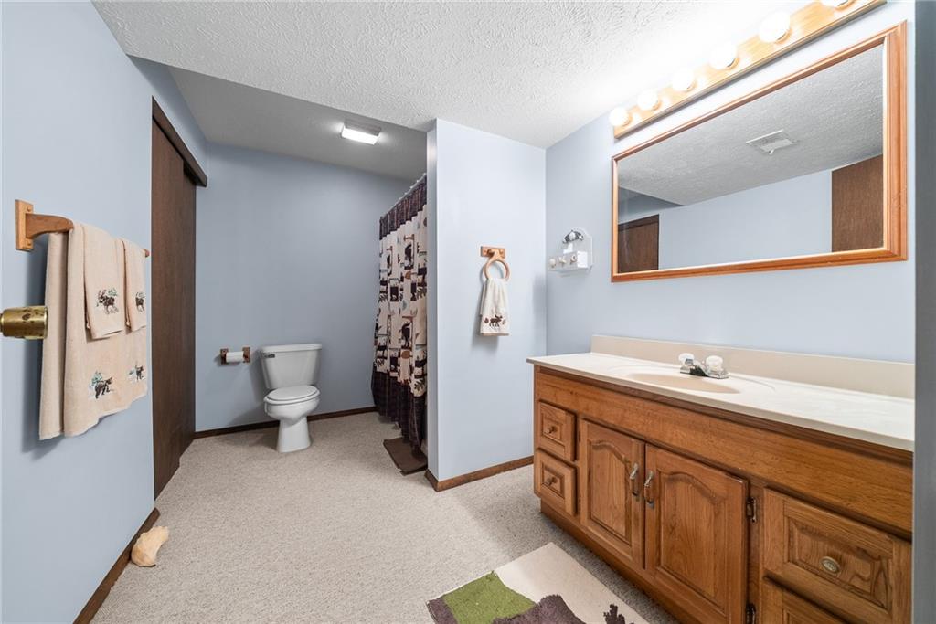 1010 Bonniebrook Road Butler, PA 16002 - Photo 32 of 48 a bathroom with a double vanity sink and mirror