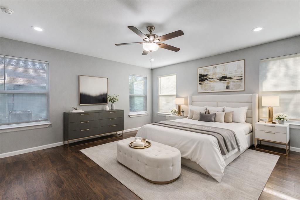 4010 Copeland Street Dallas, TX 75210 - Photo 11 of 23 a bedroom with a bed and a flat screen tv