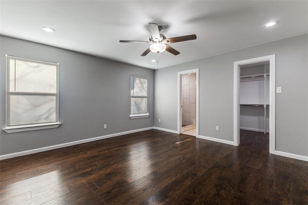 4010 Copeland Street Dallas, TX 75210 - Photo 12 of 23 a view of an empty room with wooden floor and a window