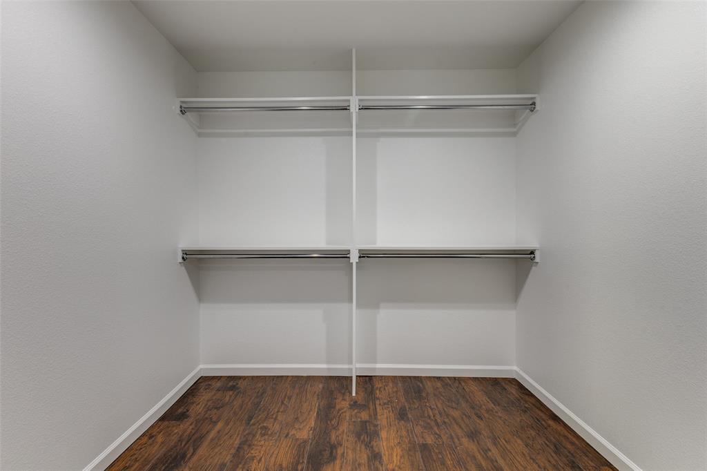 4010 Copeland Street Dallas, TX 75210 - Photo 14 of 23 a view of a room with wooden floor