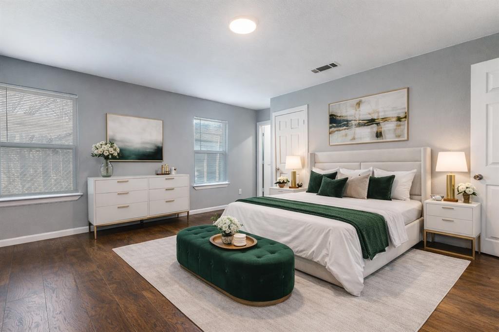 4010 Copeland Street Dallas, TX 75210 - Photo 19 of 23 a spacious bedroom with a bed and a couch