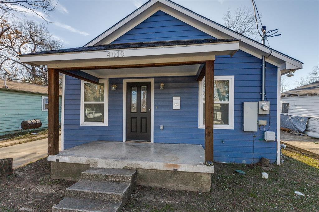 4010 Copeland Street Dallas, TX 75210 - Photo 3 of 23 a view of front of house with wooden door