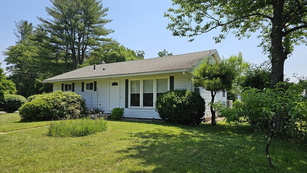 298 Ryan Road Northampton, MA 01062 - Photo 1 of 28 a front view of a house with a yard