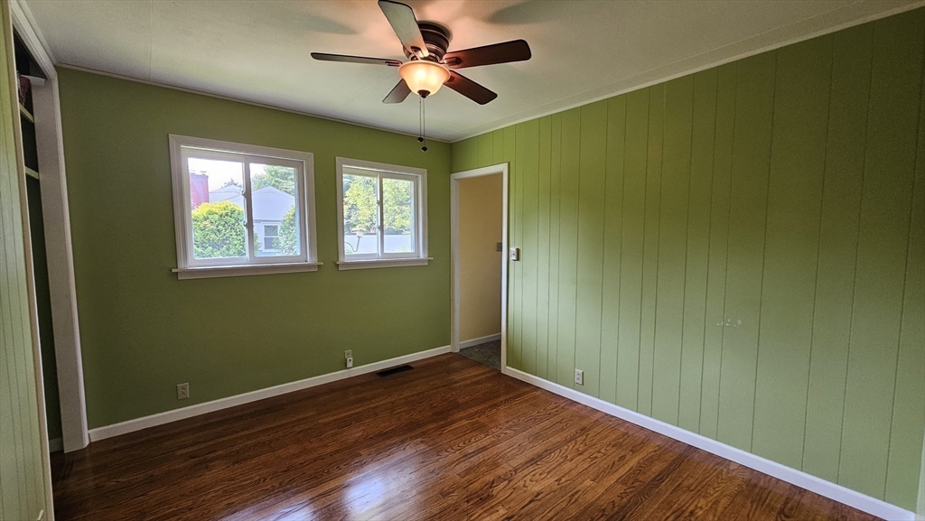 298 Ryan Road Northampton, MA 01062 - Photo 11 of 28 a view of empty room with wooden floor and fan