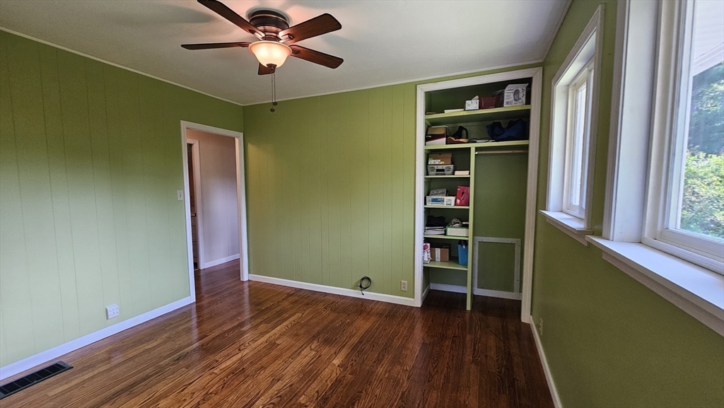 298 Ryan Road Northampton, MA 01062 - Photo 12 of 28 a view of empty room with wooden floor and fan