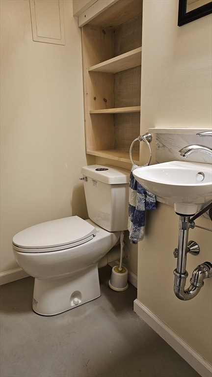 298 Ryan Road Northampton, MA 01062 - Photo 18 of 28 a bathroom with a toilet a sink and a mirror