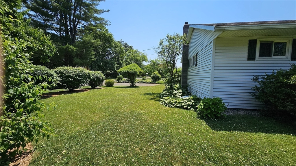 298 Ryan Road Northampton, MA 01062 - Photo 27 of 28 a view of a house with a backyard