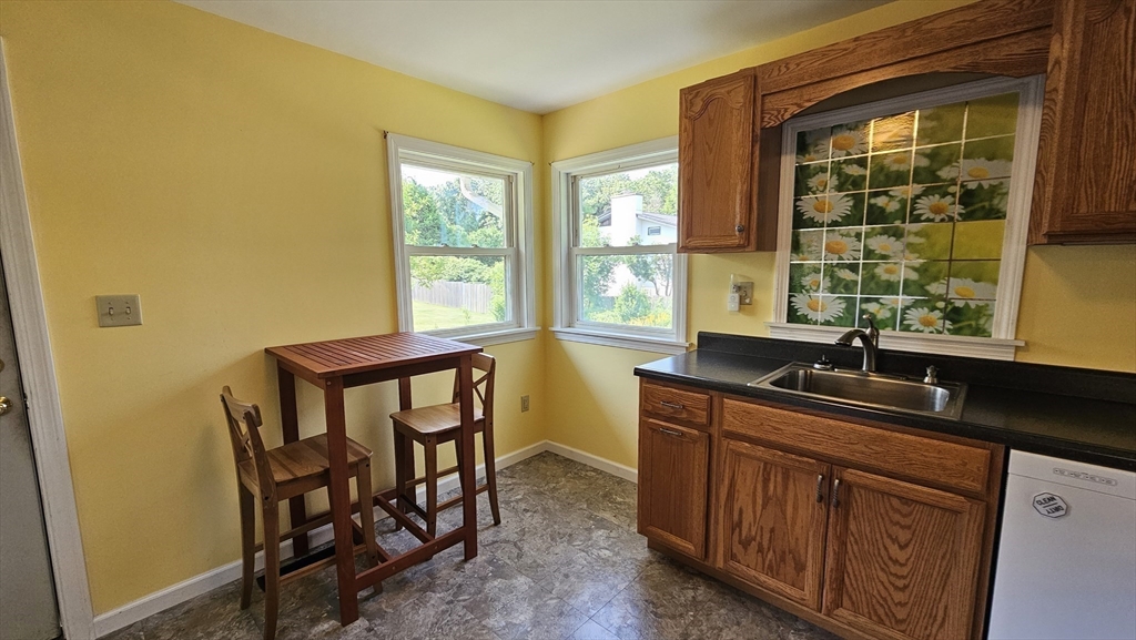 298 Ryan Road Northampton, MA 01062 - Photo 8 of 28 a kitchen with a sink and a window