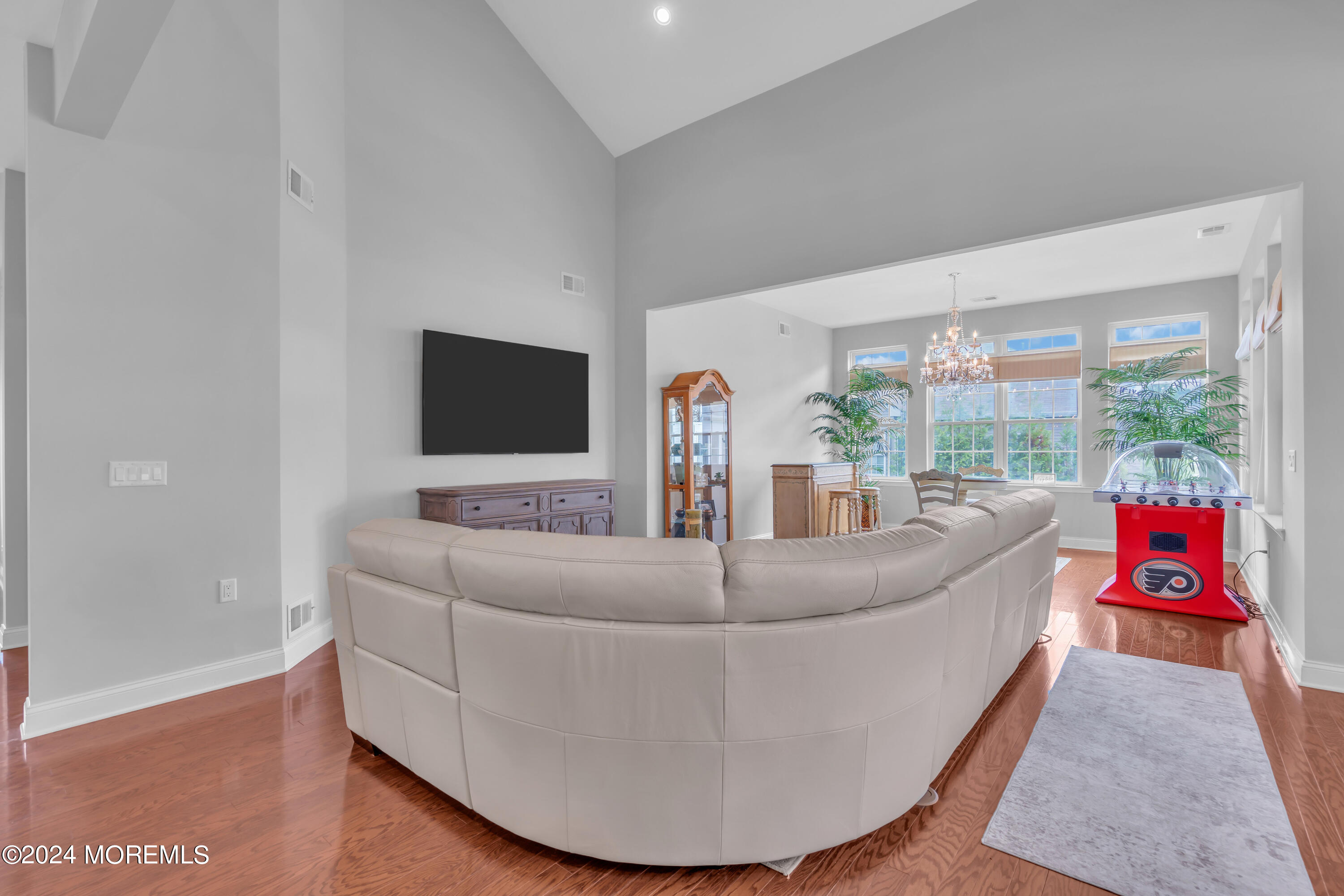 49 Eagleswood Drive Waretown, NJ 08758 - Photo 15 of 51 a living room with couch and a flat screen tv
