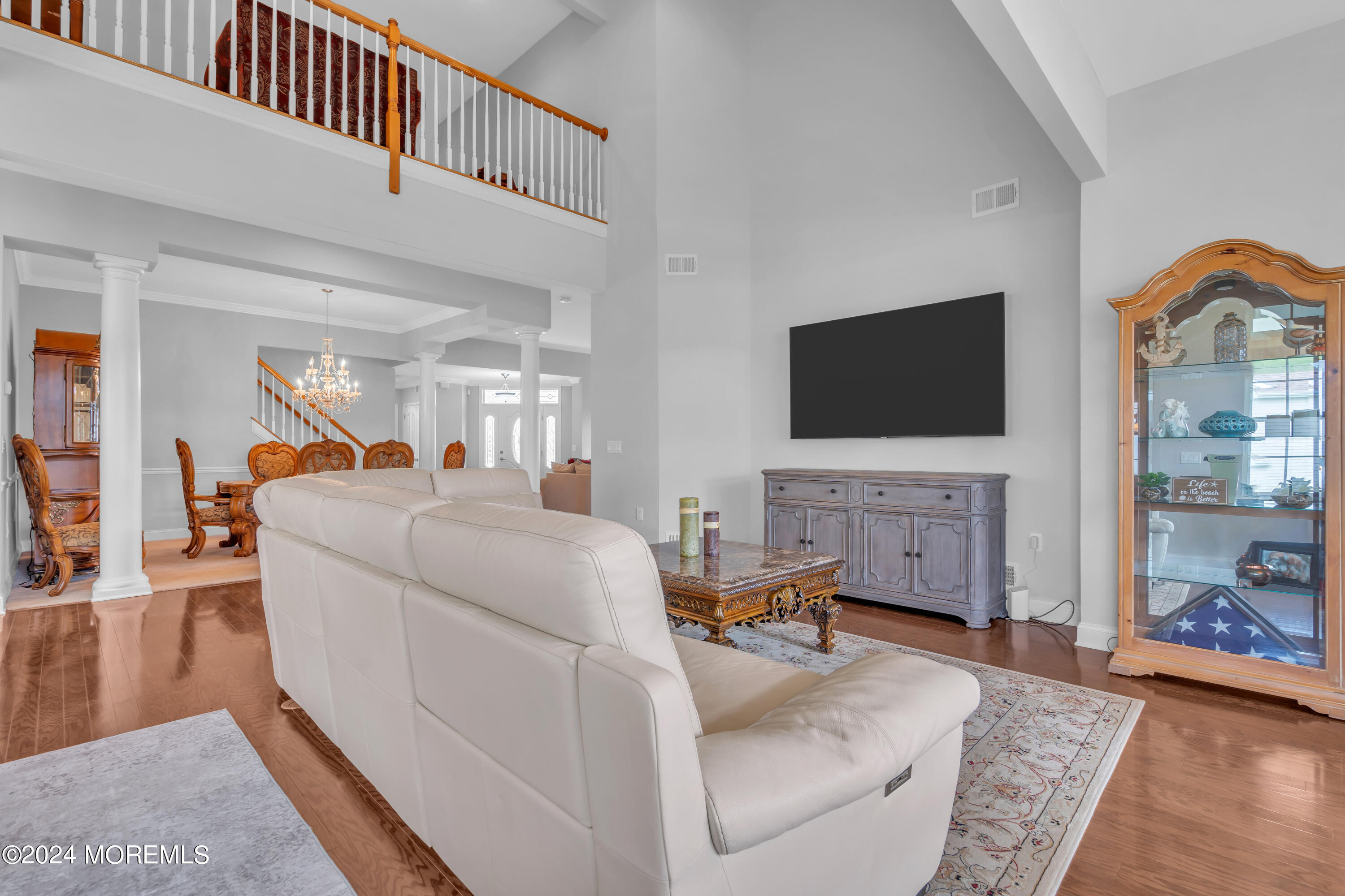49 Eagleswood Drive Waretown, NJ 08758 - Photo 16 of 51 a living room with furniture and a flat screen tv
