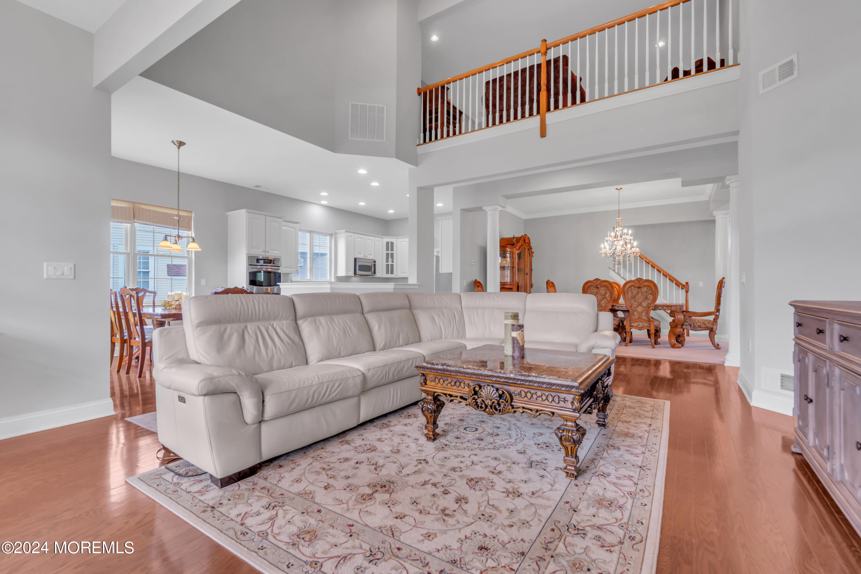 49 Eagleswood Drive Waretown, NJ 08758 - Photo 17 of 51 a living room with furniture and a table