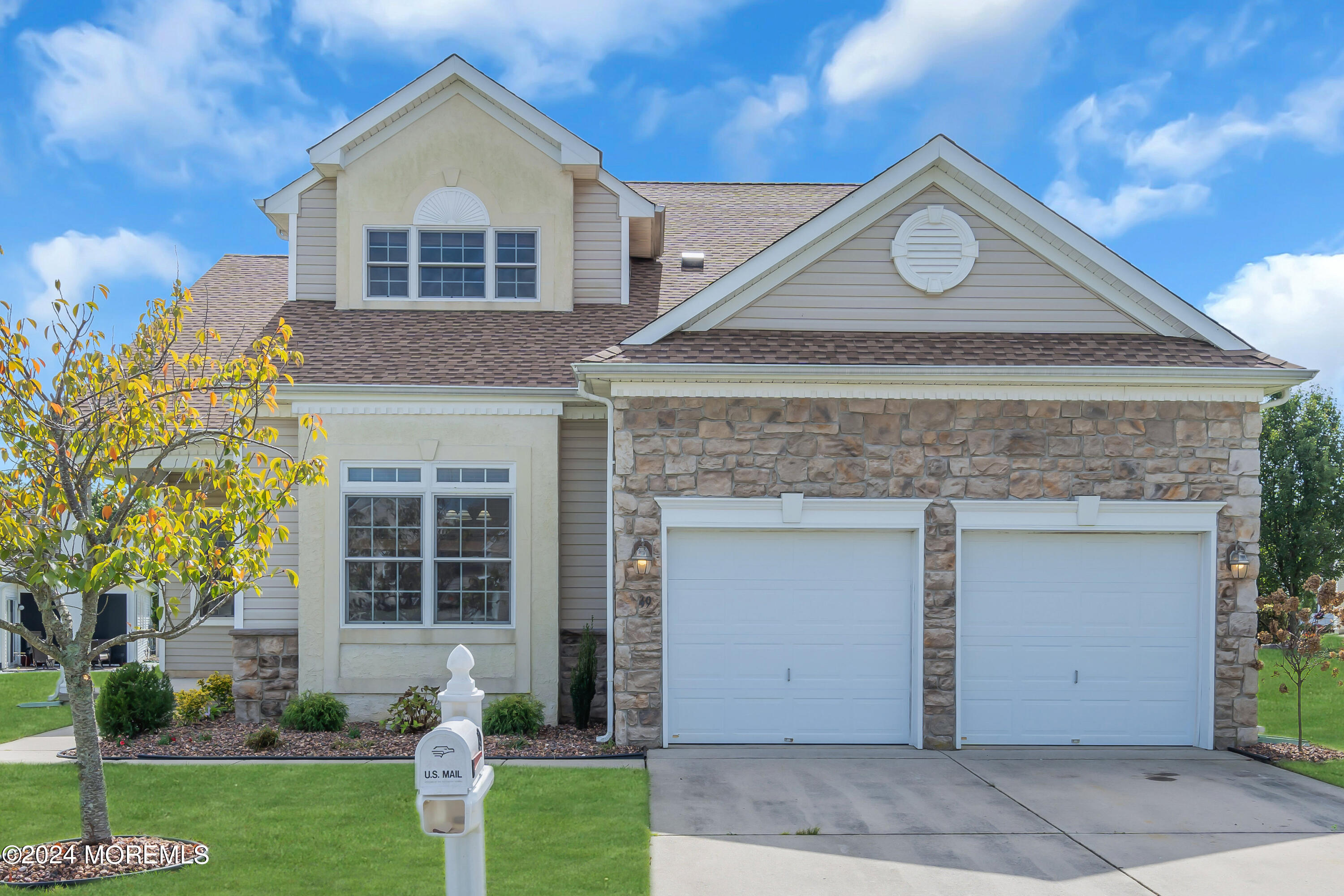 49 Eagleswood Drive Waretown, NJ 08758 - Photo 2 of 51 a front view of a house with a yard