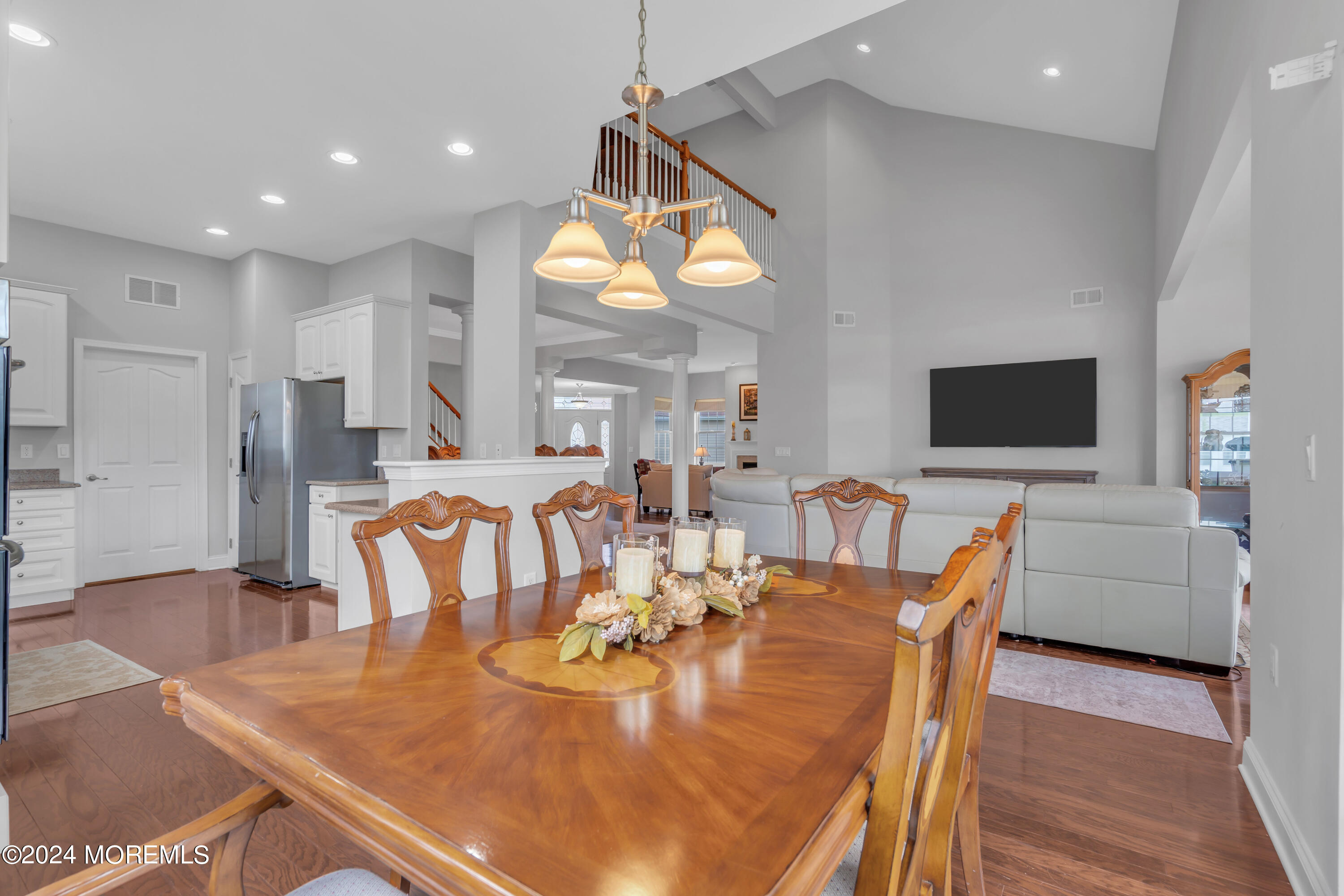 49 Eagleswood Drive Waretown, NJ 08758 - Photo 22 of 51 a view of a dining room with furniture and wooden floor