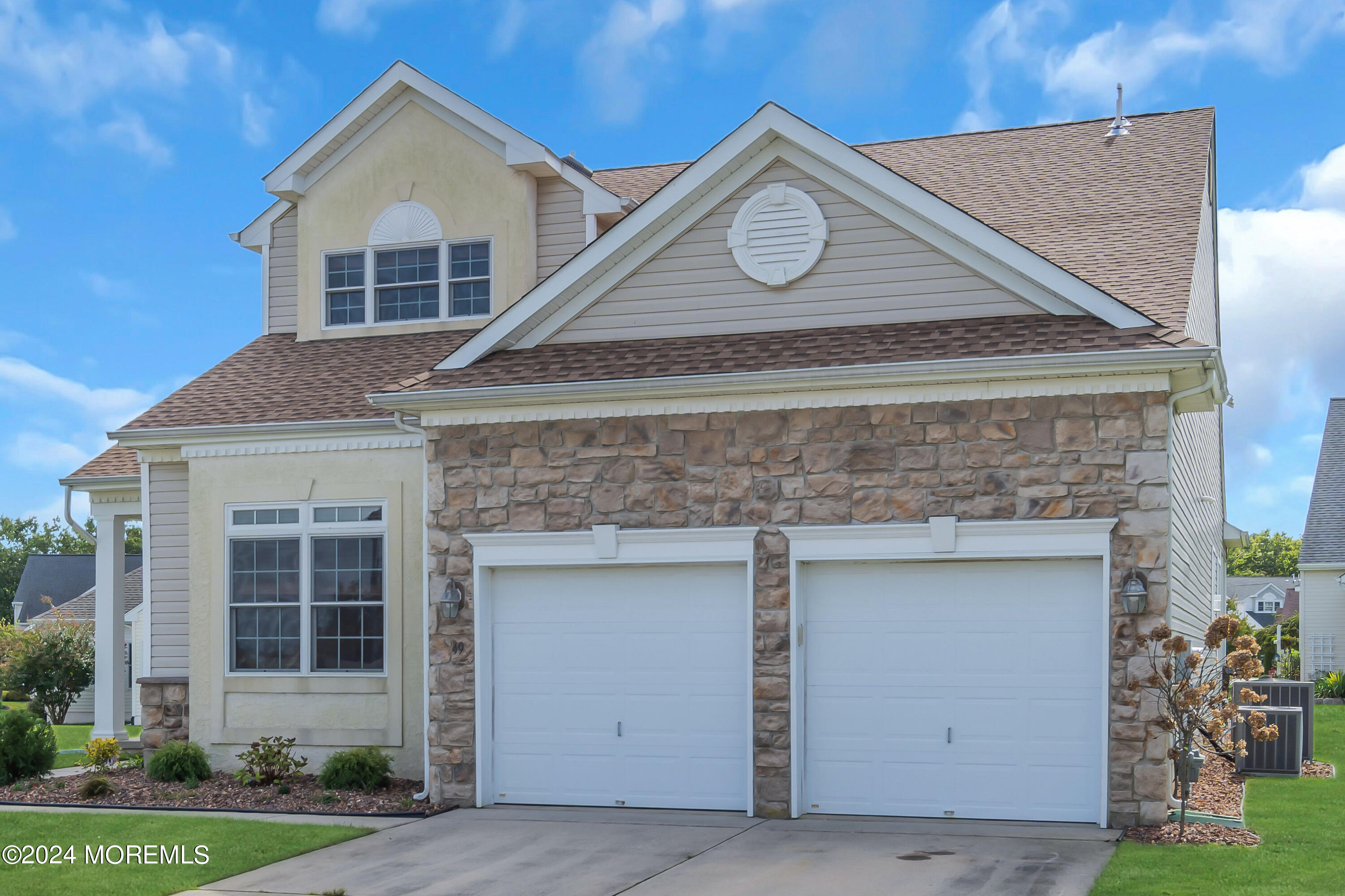49 Eagleswood Drive Waretown, NJ 08758 - Photo 3 of 51 a view of a house with a yard and garage