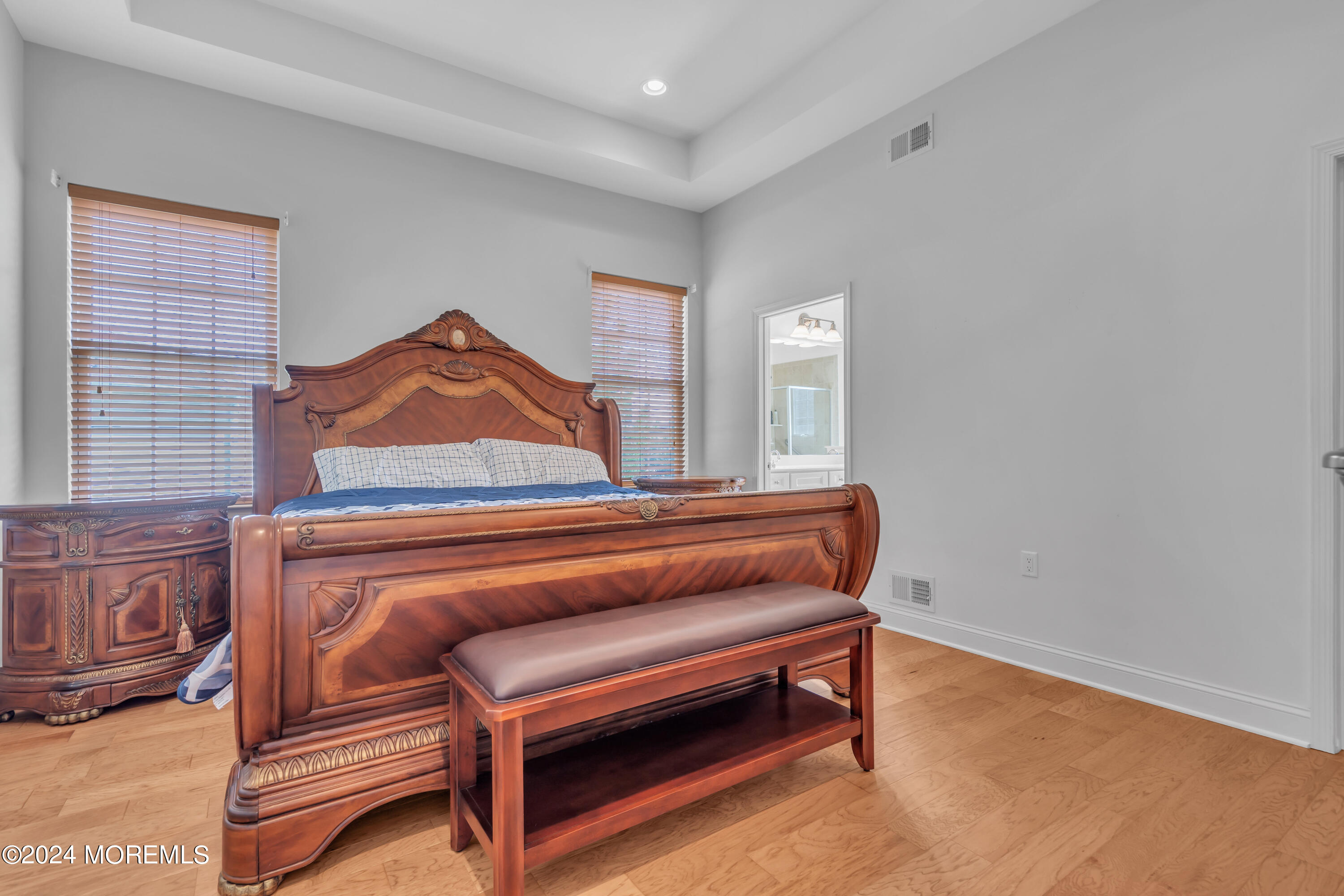49 Eagleswood Drive Waretown, NJ 08758 - Photo 31 of 51 a living room with furniture and a wooden floor