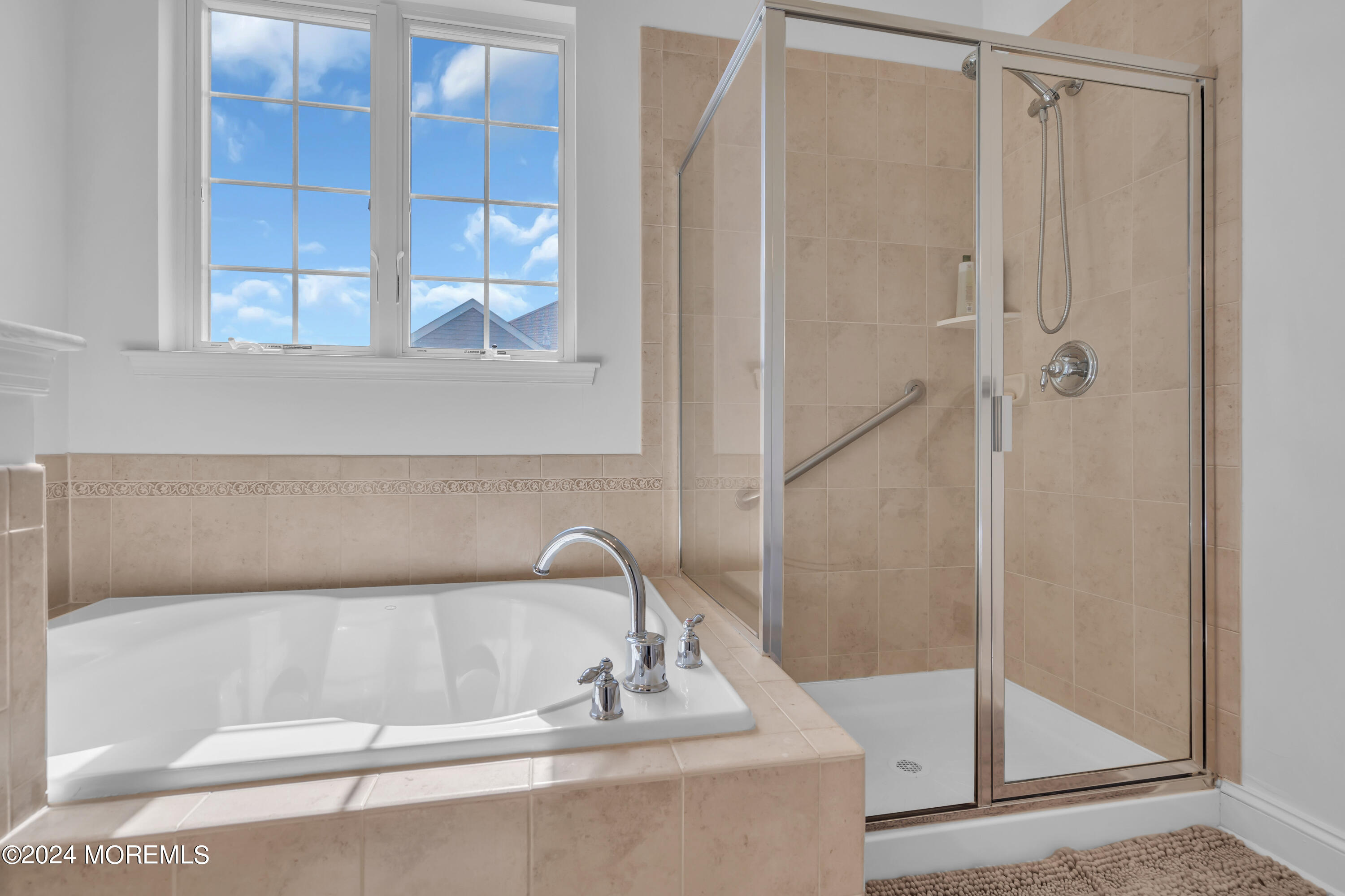 49 Eagleswood Drive Waretown, NJ 08758 - Photo 34 of 51 a bathroom with a bathtub and a shower