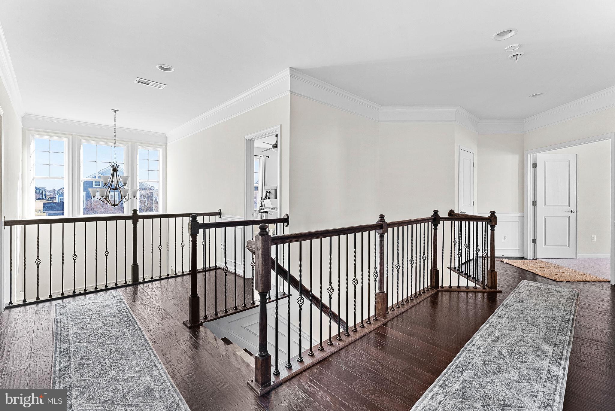 1010 Themis Street Southeast Leesburg, VA 20175 - Photo 30 of 64 a view of a hallway with wooden floor