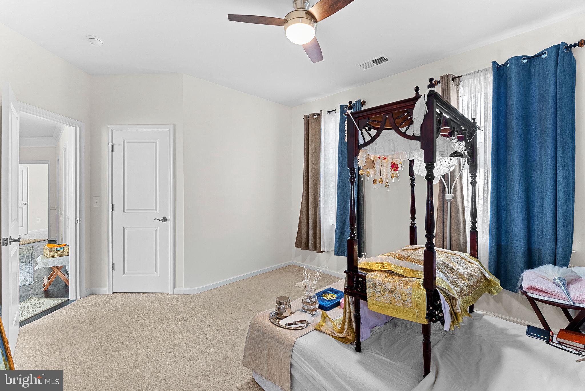 1010 Themis Street Southeast Leesburg, VA 20175 - Photo 42 of 64 a view of a livingroom with furniture and a ceiling fan