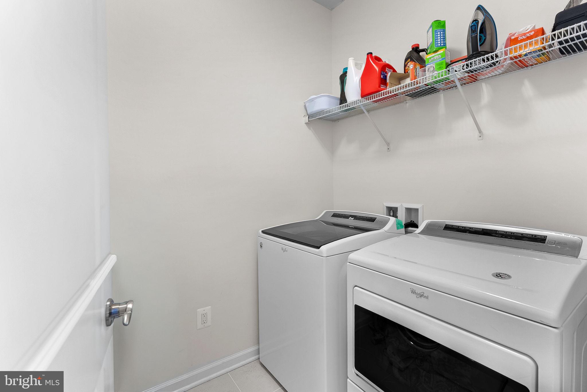 1010 Themis Street Southeast Leesburg, VA 20175 - Photo 47 of 64 a utility room with dryer and washer