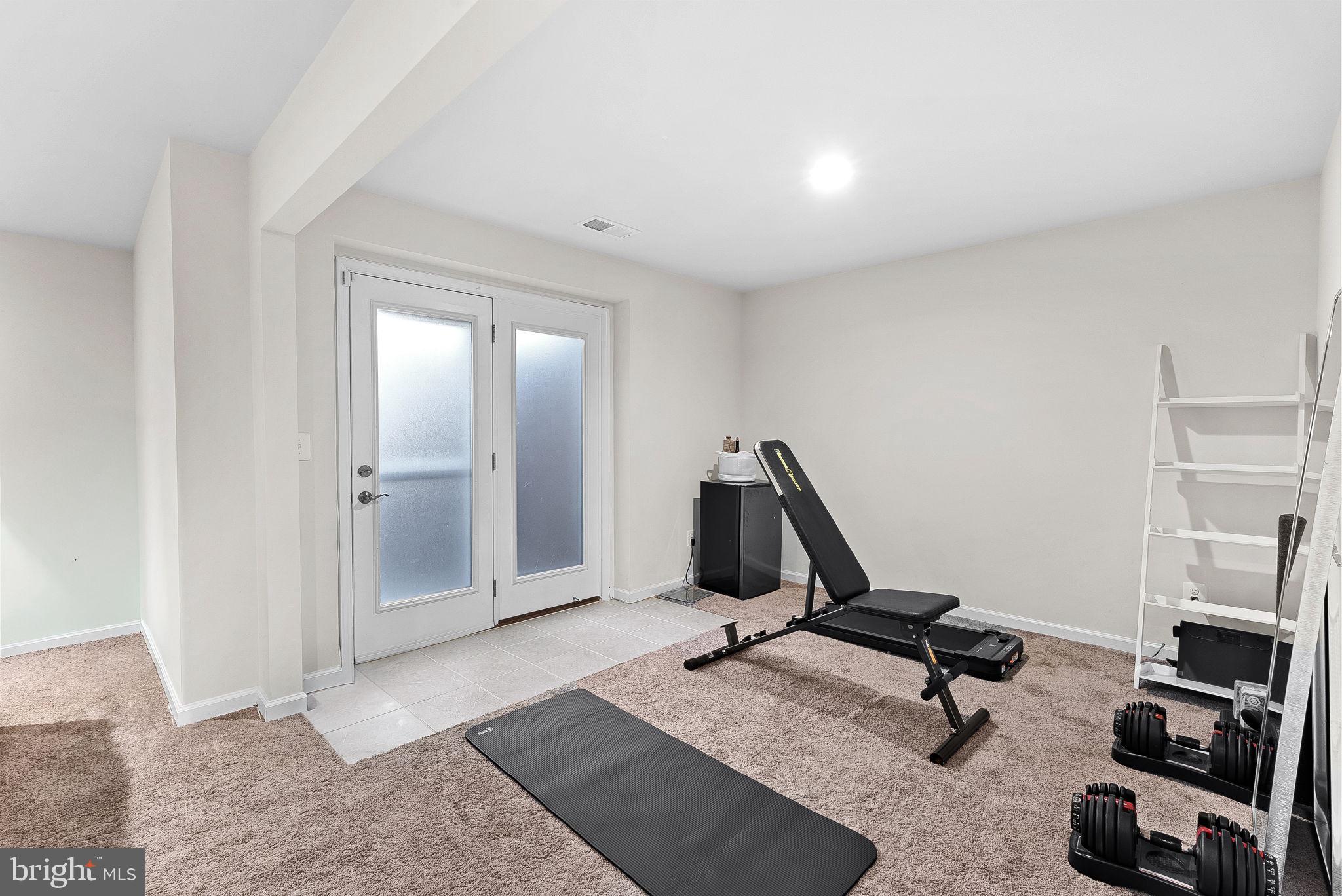 1010 Themis Street Southeast Leesburg, VA 20175 - Photo 51 of 64 a view of a room with gym equipment