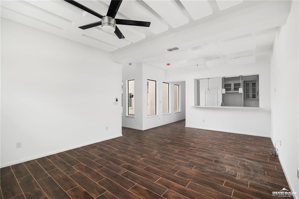 2105 Azalea Street Mission, TX 78573 - Photo 5 of 14 a view of an empty room with window and wooden floor