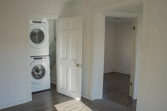 a view of storage and utility room with washer and dryer