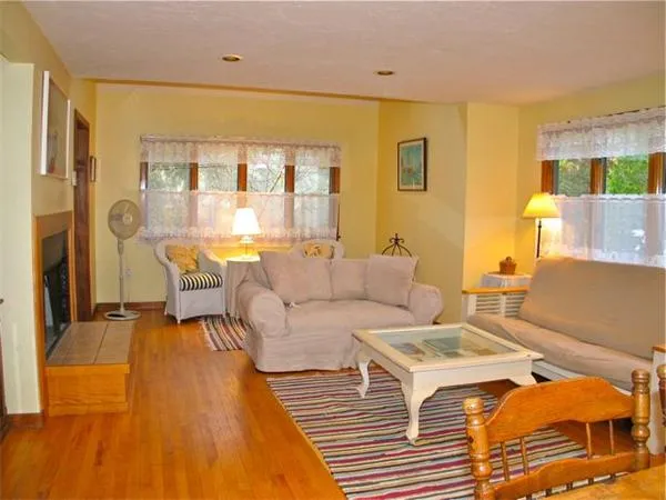 a living room with furniture and a table