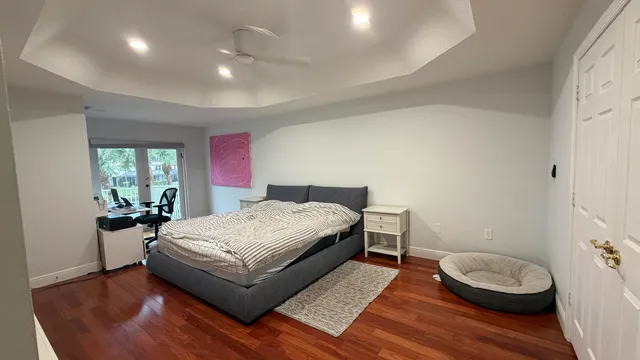 a room with a bed and a chair