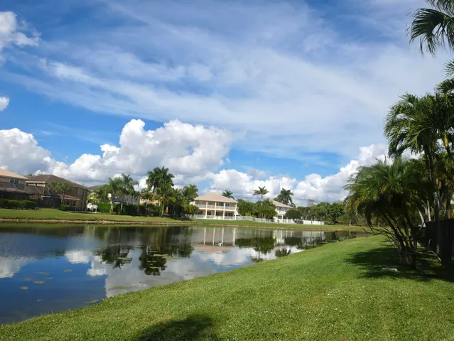 a view of a lake with a yard