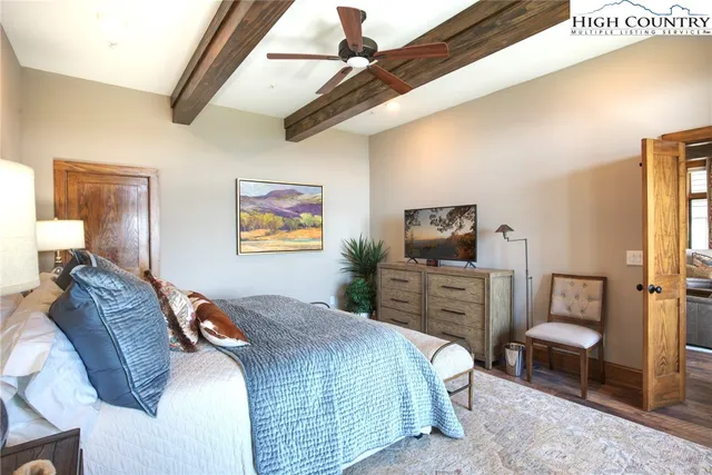 a bedroom with a bed and furniture