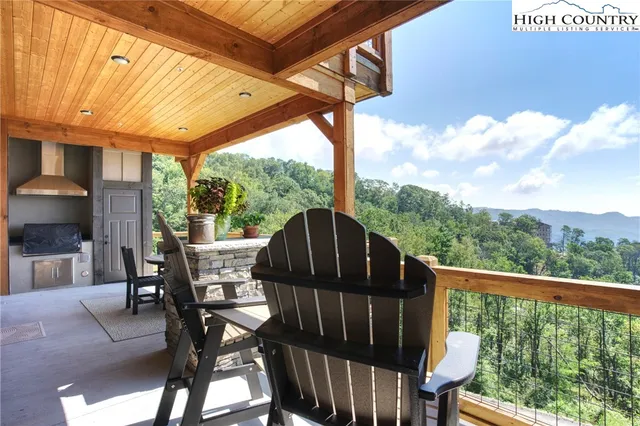 a view of a two chairs in the roof deck