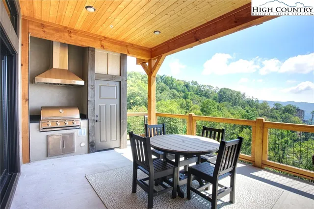 a view of a patio in the backyard