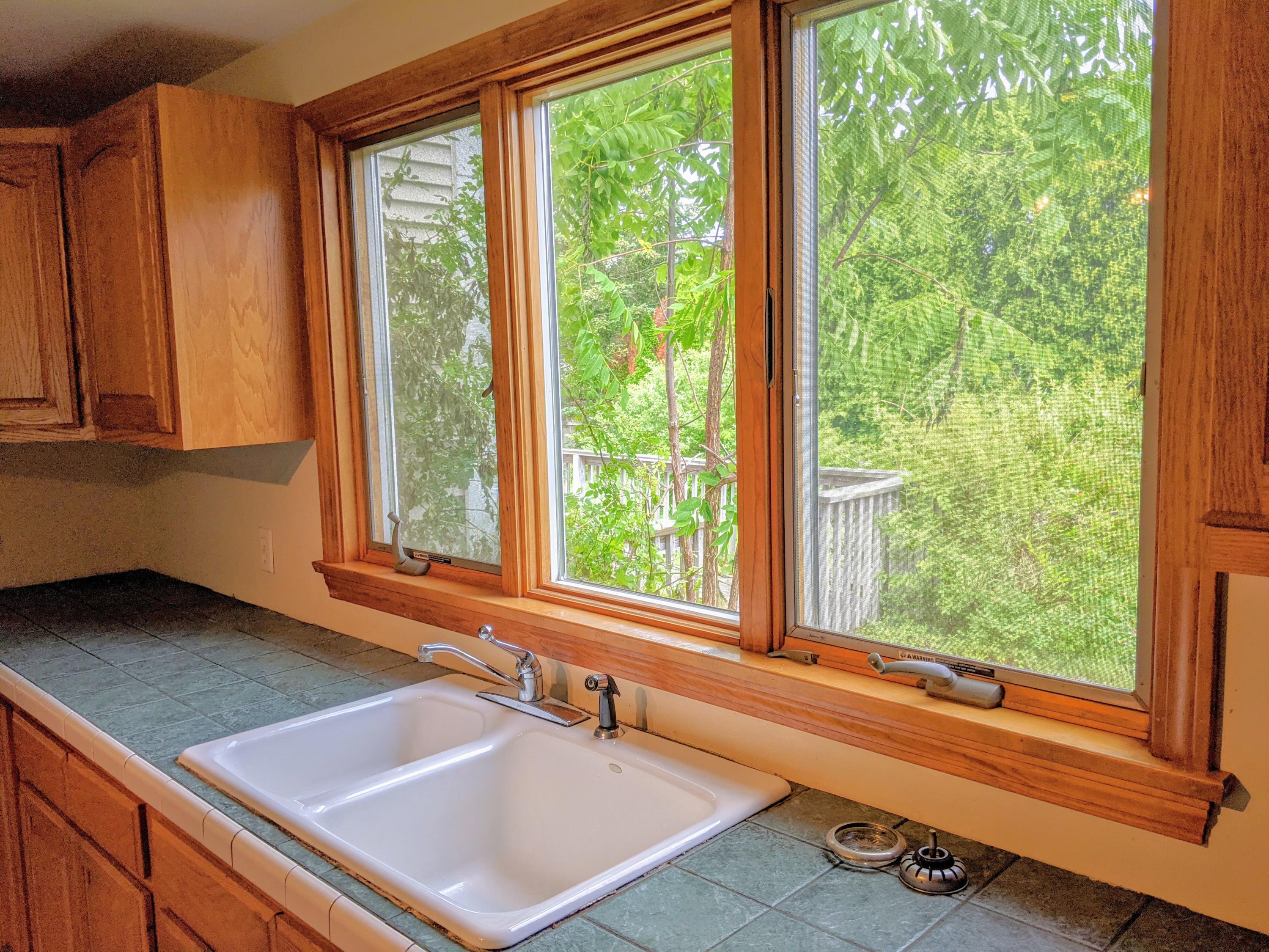 11 Knoll Top Road Sandwich, MA 02644 - Photo 3 of 12 a bathroom with a sink and a large window