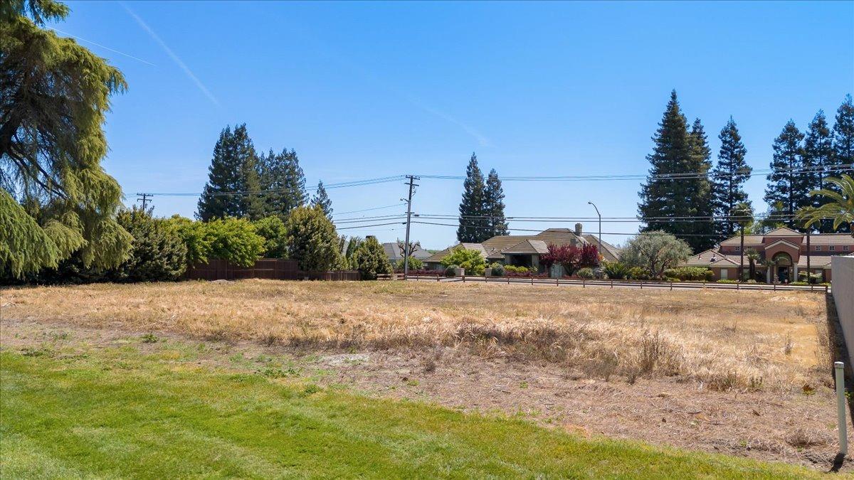 0 Country Club Drive Modesto, CA 95356 - Photo 12 of 30 a backyard of a house with lots of green space