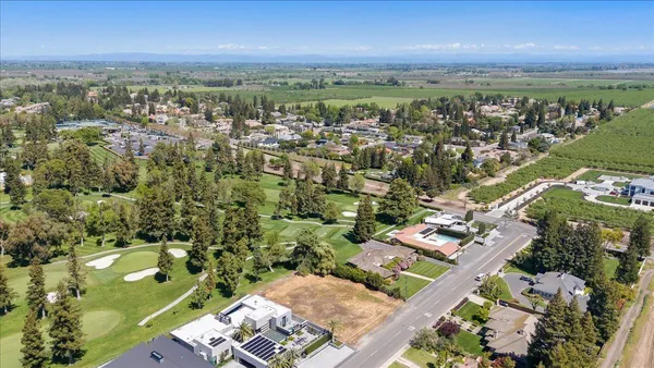 an aerial view of a city with lots of residential buildings