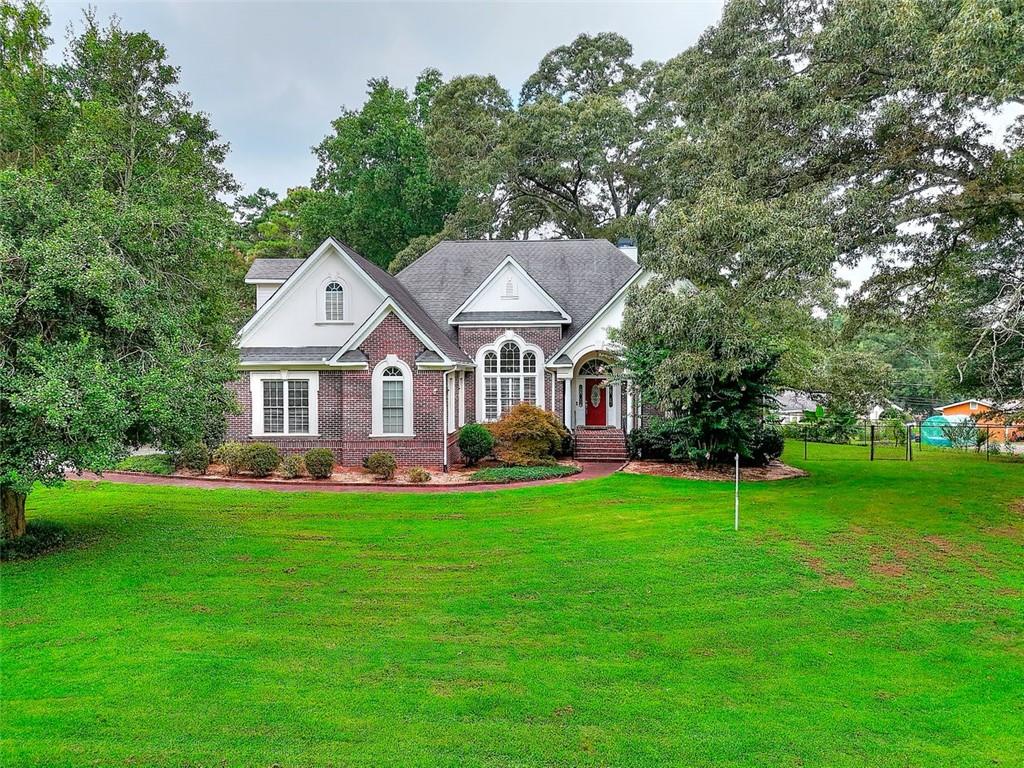 1595 Lake Lucerne Road Southwest Lilburn, GA 30047 - Photo 1 of 1 Gallery Image 1